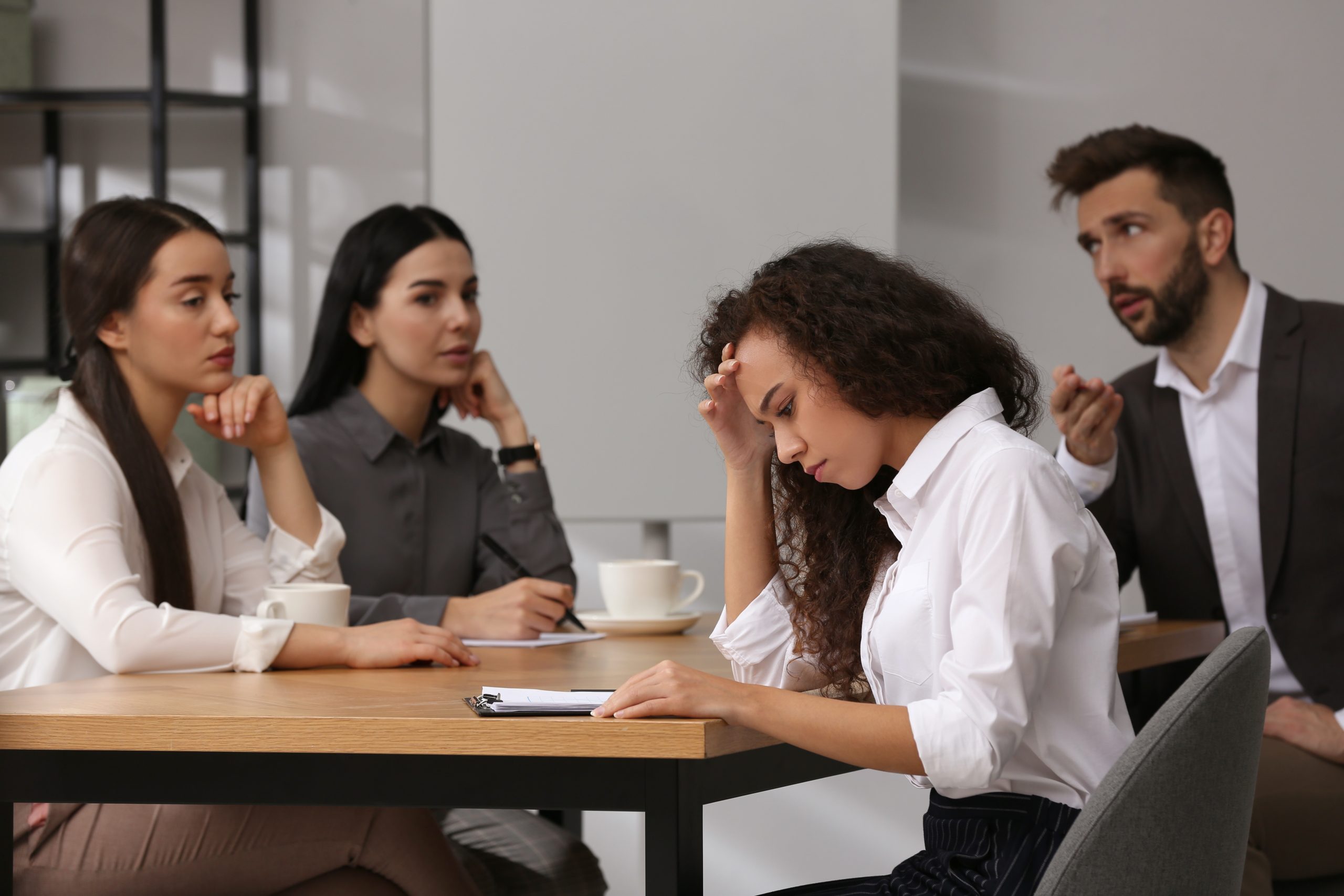 Employees navigating workplace conflict and inappropriate behavior